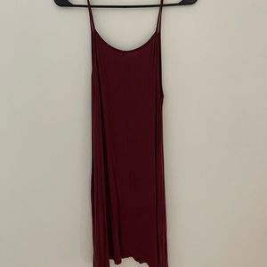 Maroon spaghetti strap dress with pockets.